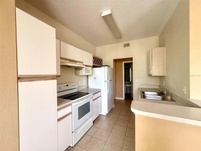 2668 ROBERT TRENT JONES DRIVE 434, Orlando, FL 32835