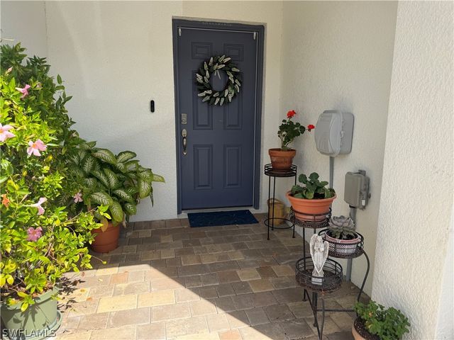 15477 Wildflower CIR, Naples, FL 34119