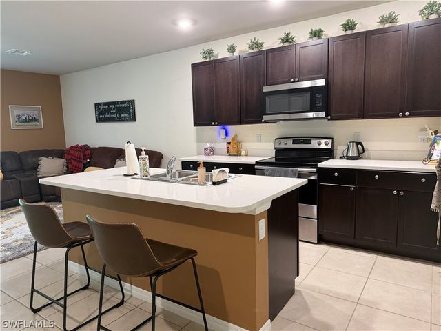 15477 Wildflower CIR, Naples, FL 34119