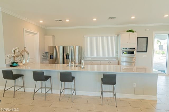 15477 Wildflower CIR, Naples, FL 34119