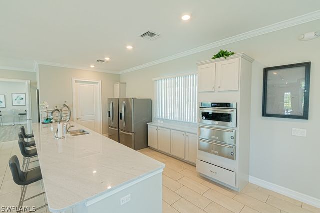 15477 Wildflower CIR, Naples, FL 34119