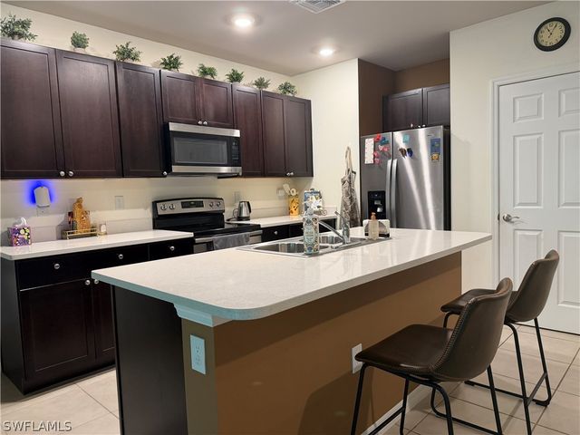 15477 Wildflower CIR, Naples, FL 34119