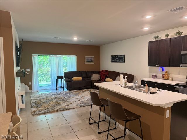 15477 Wildflower CIR, Naples, FL 34119