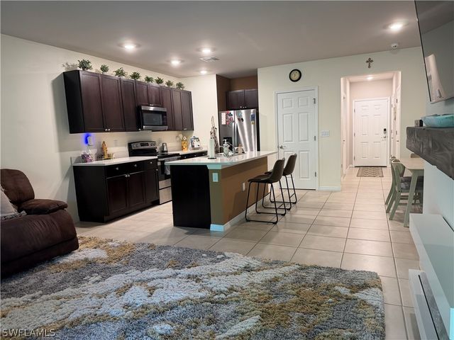 15477 Wildflower CIR, Naples, FL 34119