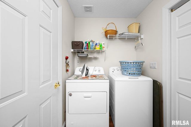 451 CELESTE Circle, Blue Grass, IA 52726