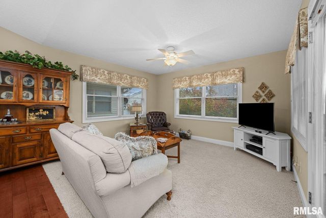 451 CELESTE Circle, Blue Grass, IA 52726