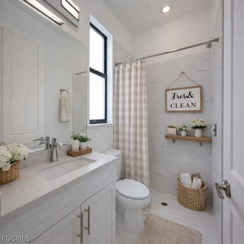 714 W 12th ST, Lehigh Acres, FL 33972