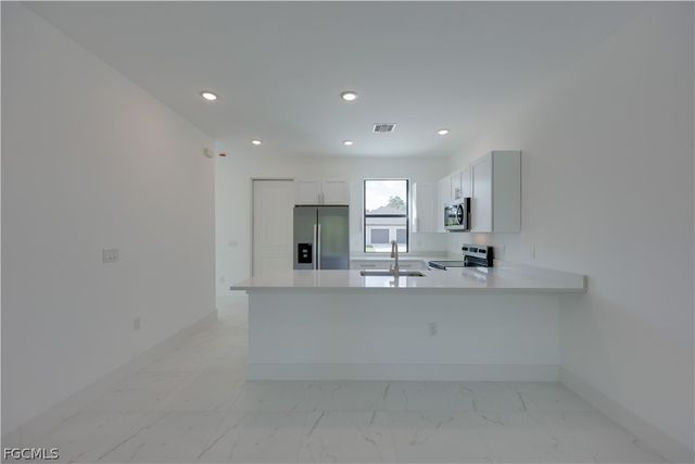 714 W 12th ST, Lehigh Acres, FL 33972