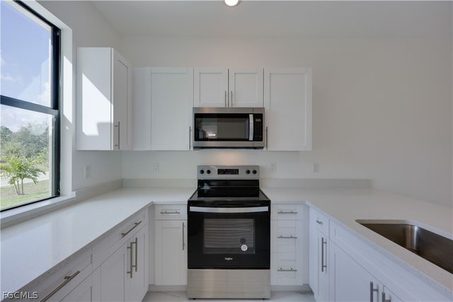 714 W 12th ST, Lehigh Acres, FL 33972