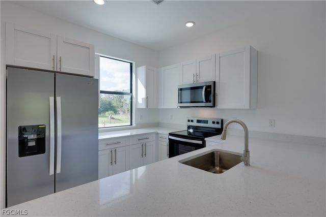 714 W 12th ST, Lehigh Acres, FL 33972