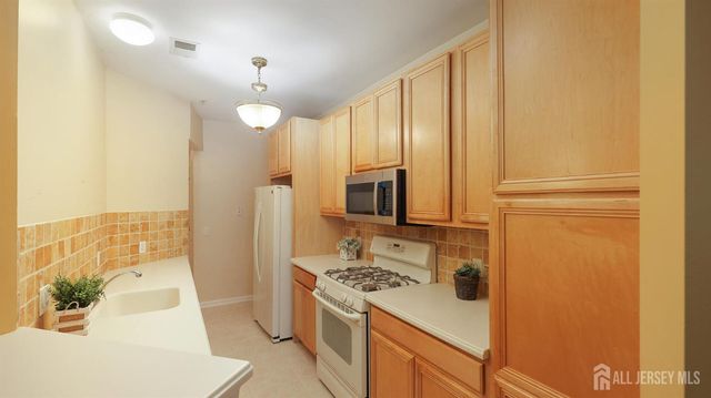 2207 Cedar Village Boulevard, East Brunswick, NJ 08816