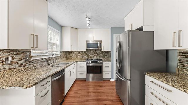 450 Manor Glen Drive, Suwanee, GA 30024
