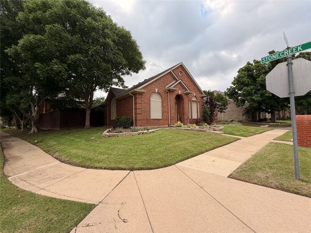 8640 Woodcreek Drive, Irving, TX 75063
