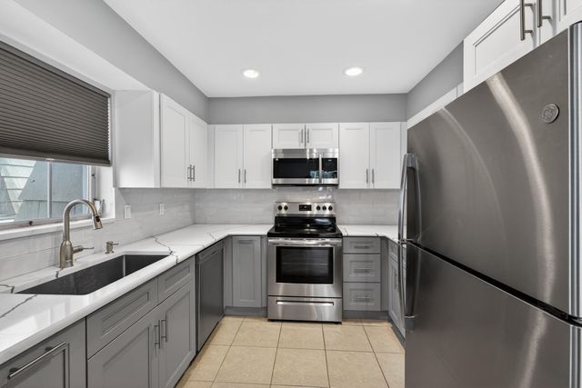 423 Pine Tree Court 23, Atlantis, FL 33462