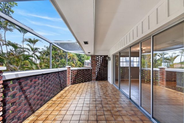 423 Pine Tree Court 23, Atlantis, FL 33462