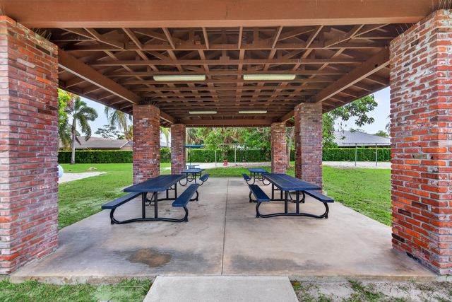 423 Pine Tree Court 23, Atlantis, FL 33462