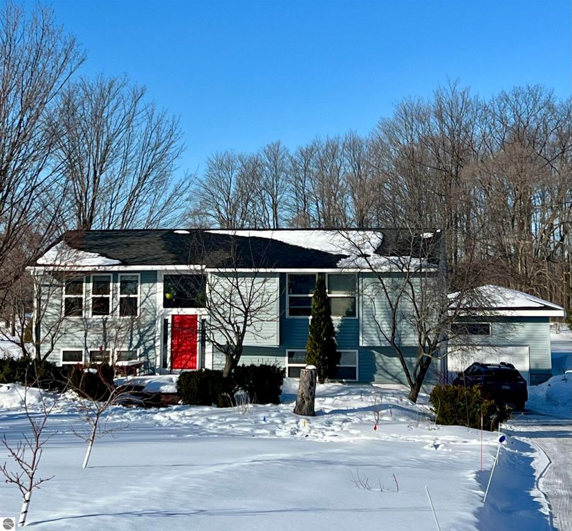 Image 1 of property listing at 13352 Indian Road, Kewadin, MI 49648