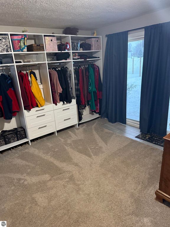 Image 22 of property listing at 13352 Indian Road, Kewadin, MI 49648