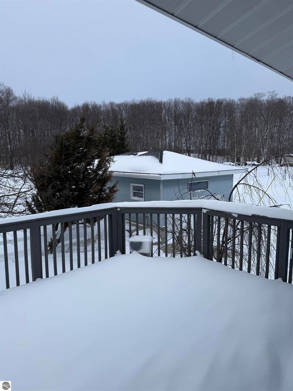 Image 29 of property listing at 13352 Indian Road, Kewadin, MI 49648