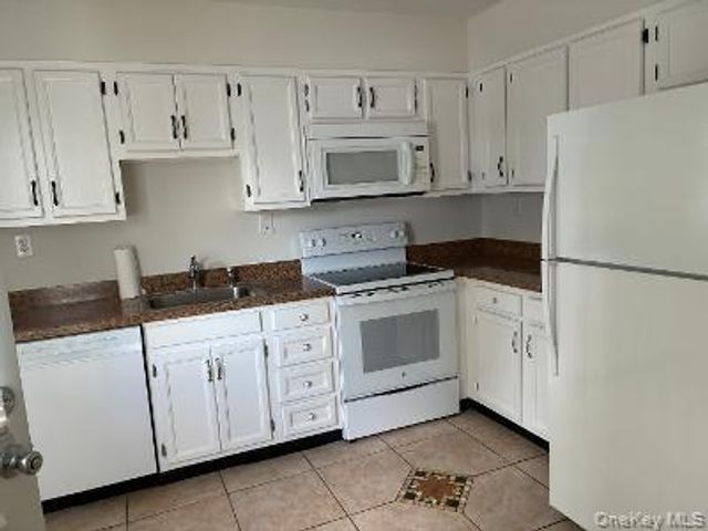 353 Woodbridge Drive, Ridge, NY 11961