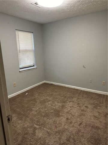 5277 Rosestone NW Drive, Lilburn, GA 30047