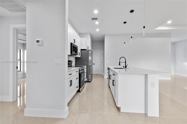 456 Mercedes CT, Lehigh Acres, FL 33972