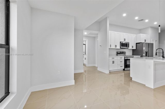456 Mercedes CT, Lehigh Acres, FL 33972