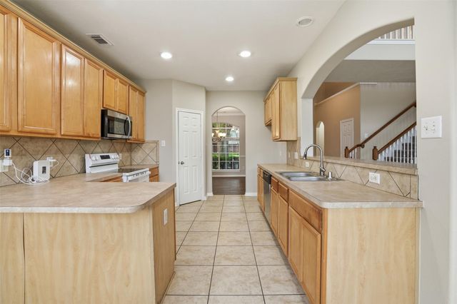 7335 Slippery Elm Lane, Houston, TX 77095
