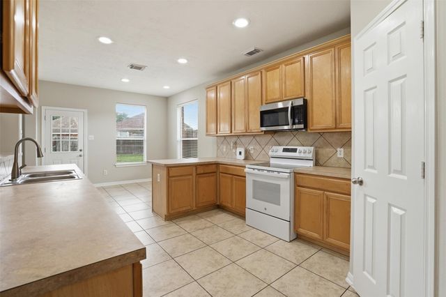 7335 Slippery Elm Lane, Houston, TX 77095