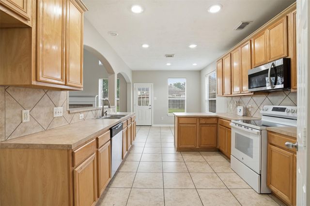 7335 Slippery Elm Lane, Houston, TX 77095