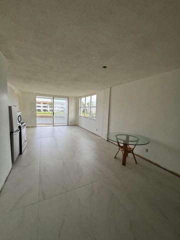 100 PARADISE HARBOUR Boulevard 212, North Palm Beach, FL 33408