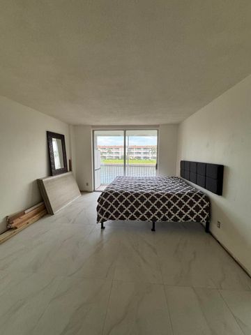 100 PARADISE HARBOUR Boulevard 212, North Palm Beach, FL 33408