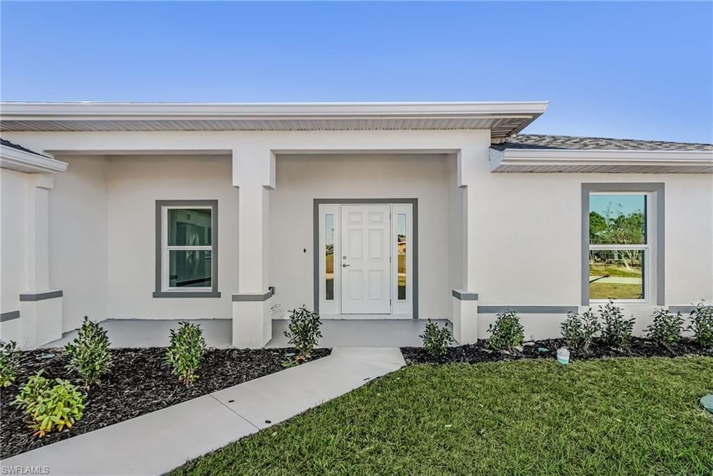 Image 3 of property listing at 1128 NW 9th TER, Cape Coral, FL 33993