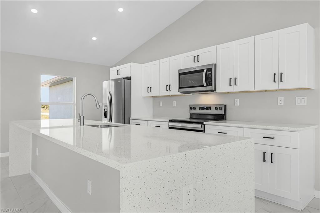 Image 7 of property listing at 1128 NW 9th TER, Cape Coral, FL 33993