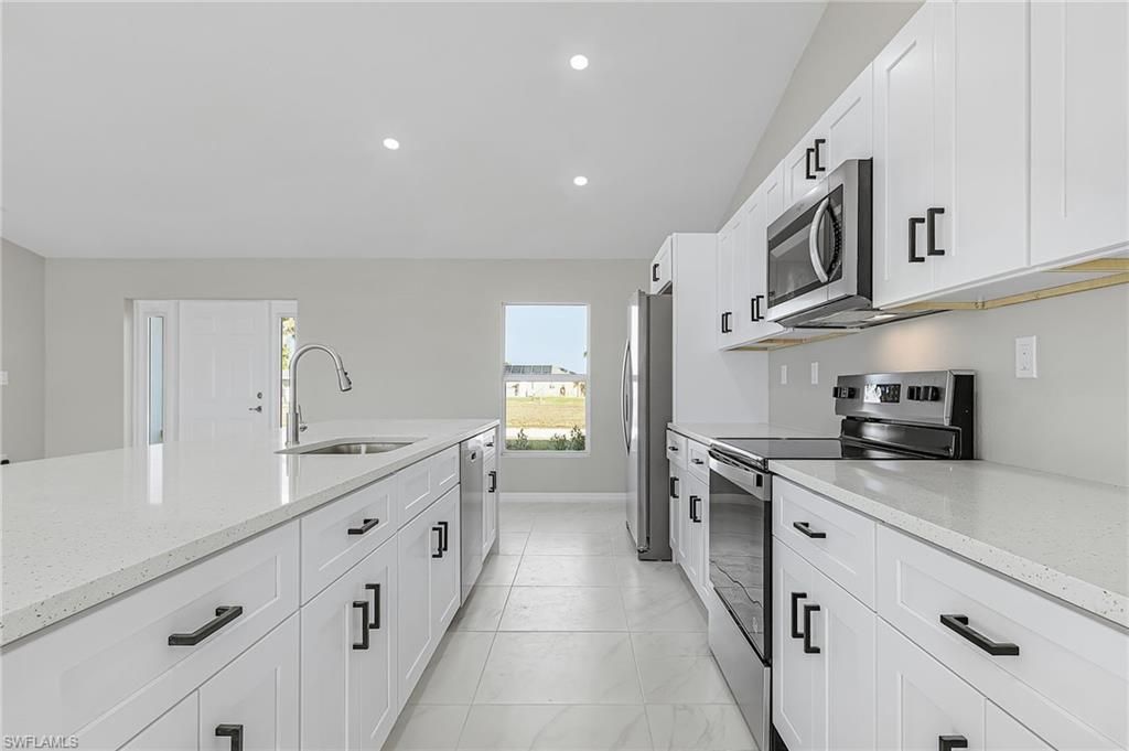 Image 8 of property listing at 1128 NW 9th TER, Cape Coral, FL 33993