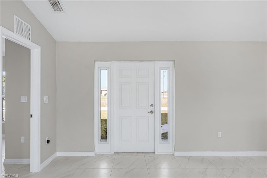 Image 9 of property listing at 1128 NW 9th TER, Cape Coral, FL 33993