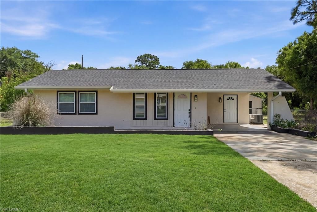 1702 E 6th ST, LEHIGH ACRES, FL 33972 — exterior