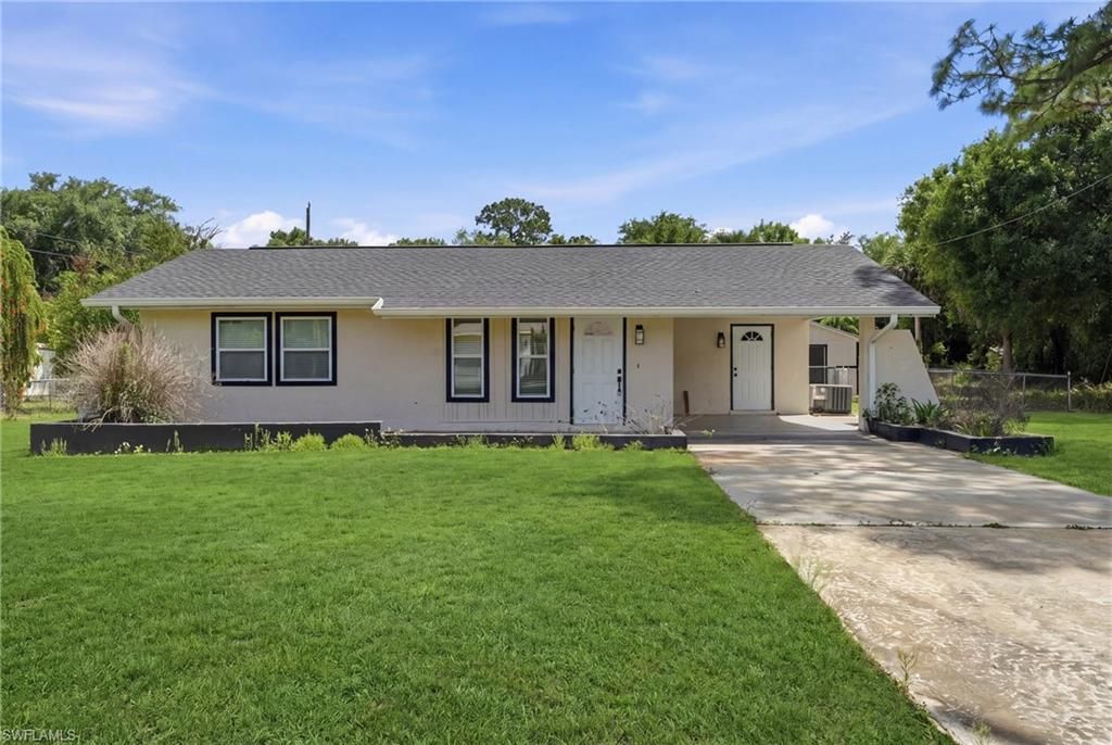 1702 E 6th ST, LEHIGH ACRES, FL 33972 — photo 2
