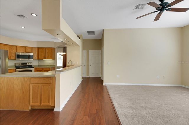 3715 MULBERRY GROVE LOOP, Leesburg, FL 34748