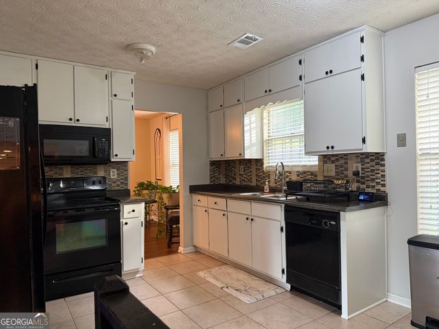3823 Rock Hollow Court, Conley, GA 30288
