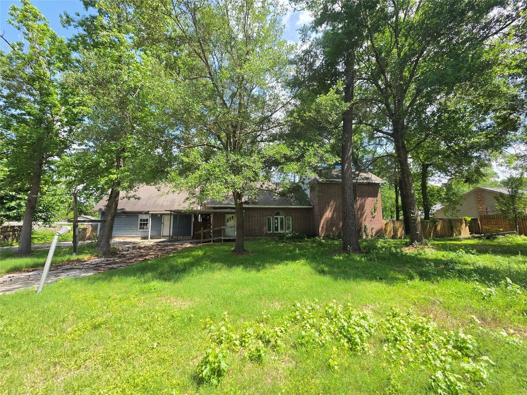 12222 Oak Hollow Lane, Pinehurst, TX 77362