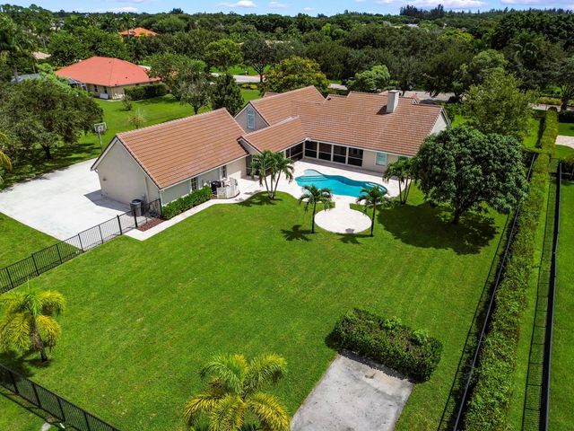 5703 Lago Del Sol Drive, Lake Worth, FL 33449