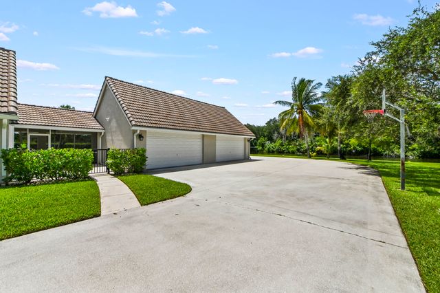 5703 Lago Del Sol Drive, Lake Worth, FL 33449