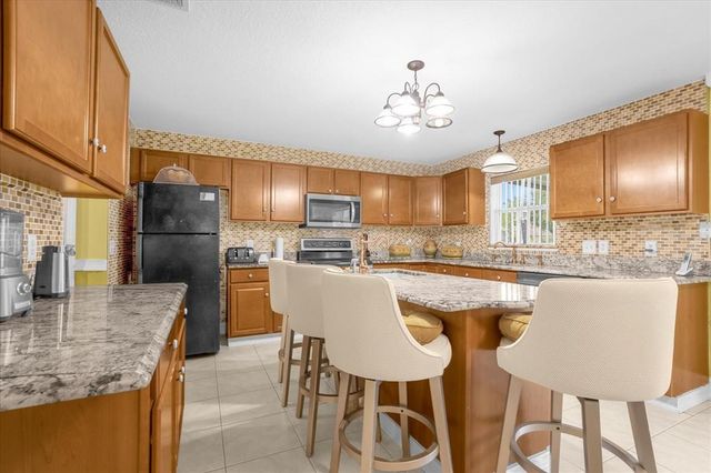 11407 BENTRY STREET, Orlando, FL 32824