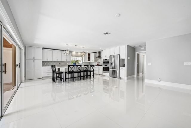 417 N Country Club Drive, Atlantis, FL 33462