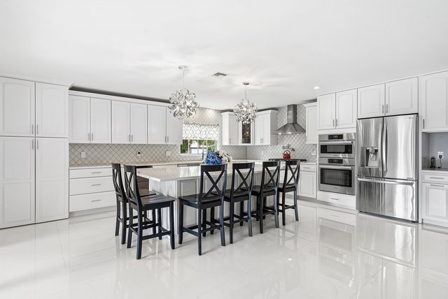 417 N Country Club Drive, Atlantis, FL 33462