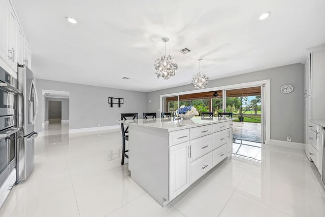 417 N Country Club Drive, Atlantis, FL 33462