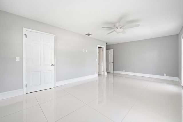 417 N Country Club Drive, Atlantis, FL 33462