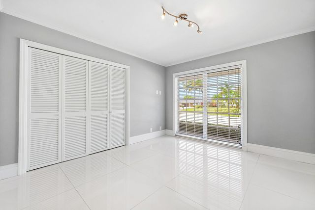 417 N Country Club Drive, Atlantis, FL 33462