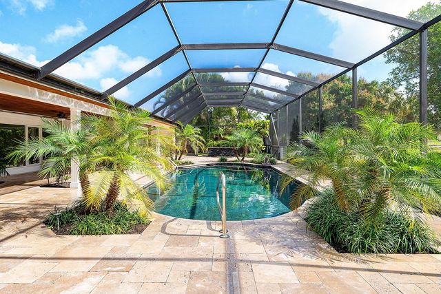 417 N Country Club Drive, Atlantis, FL 33462